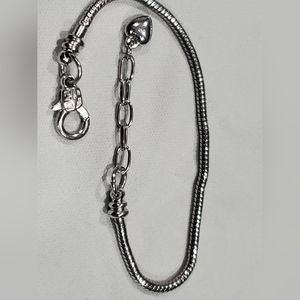 Silver tone charm/bead bracelet